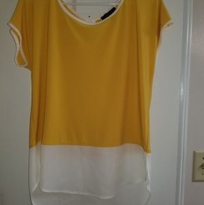 Lightweight yellow top with white sheer bottom